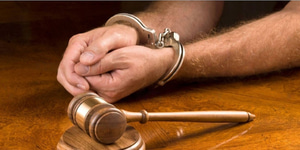 a-man-arrested-awaits-the-judge-to-use-his-gavel-to-render-a-decision-BDDT92-transformed.jpeg